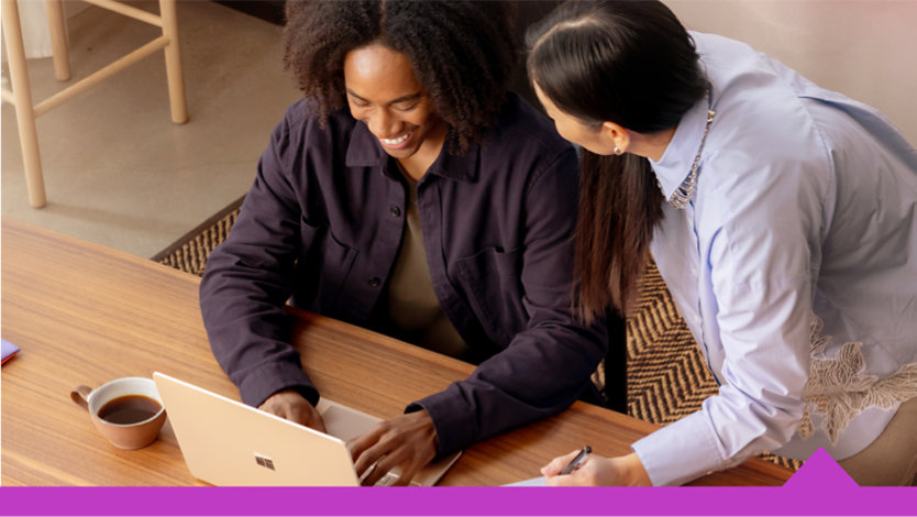 Two people collaborating at work.